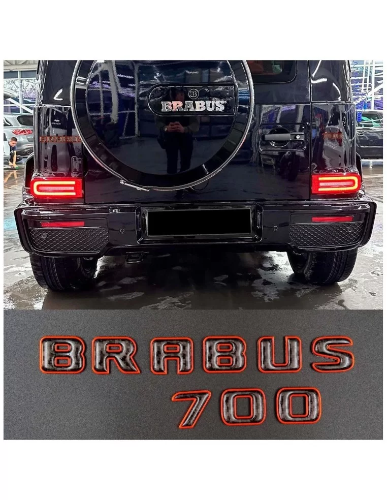  - logo & Emblems - Brabus 700 arancione con emblema in carbonio per Mercedes-Benz W463A - 1 - Elevate la vostra Mercedes-Benz W